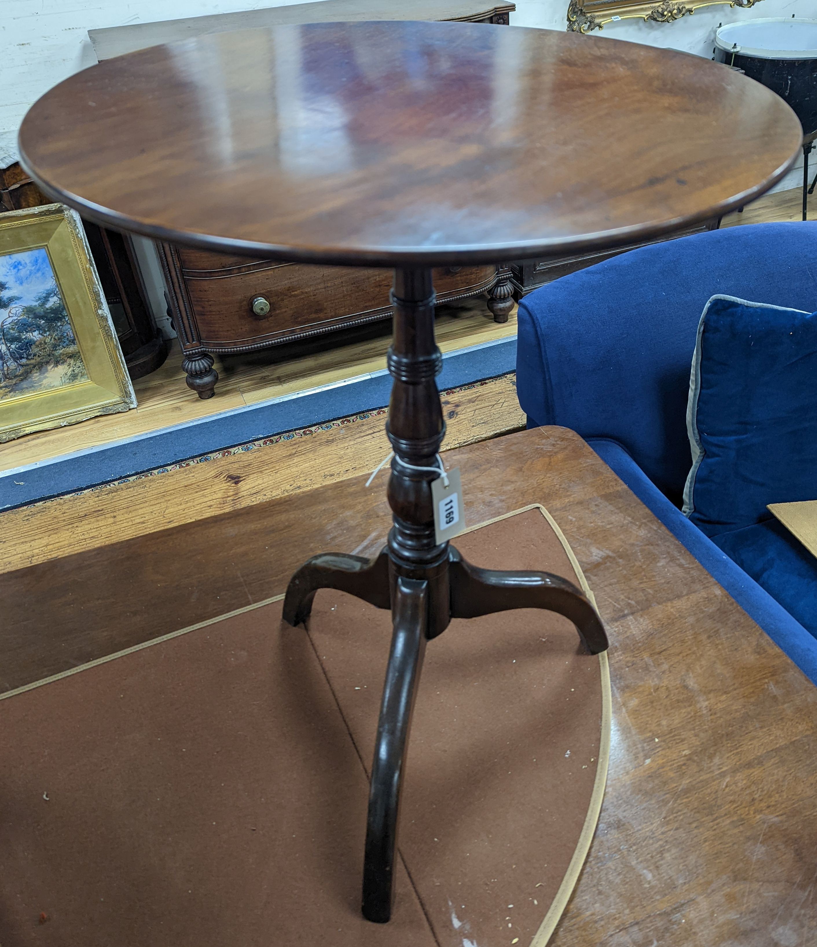 A 19th century circular mahogany tripod wine table, diameter 50cm, height 66cm